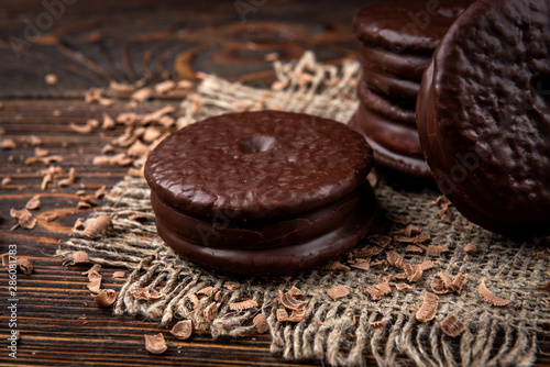Chocolate cookies on dark wooden background. Chocolate pie.