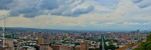 Fototapeta Naklejka Na Ścianę i Meble -  view of the city of Yerevan from the observation deck on a sunny day with clouds in the sky.