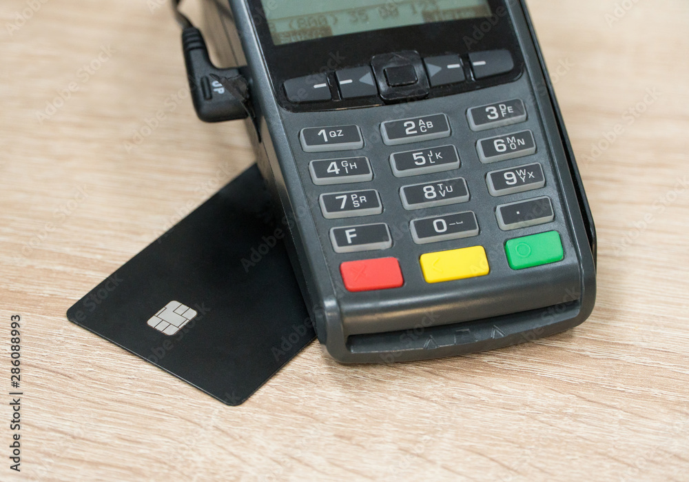 payment terminal with card. close-up payment terminal with card. close-up