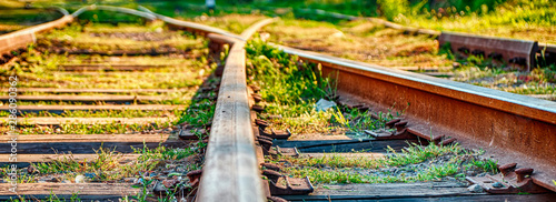 Railway sleepers and rails close-up. photo