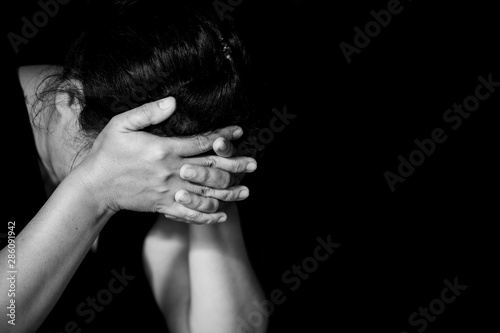 Woman touching her temples