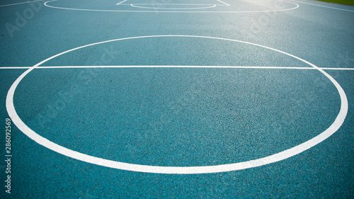 A close up of a outdoor basketball court