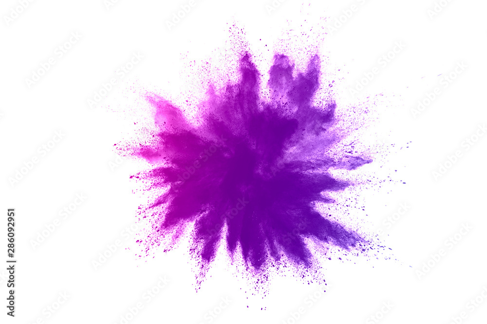 Freeze motion of purple color powder exploding on white background. Freeze motion of purple color powder exploding on white background.