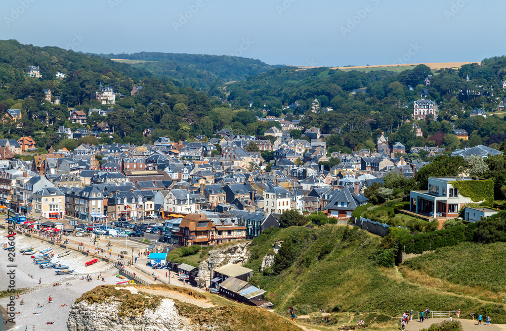 Aerial panoramic view of the old town of Etretat, popular tourists destination in Seine-Maritime department in Normandy, France.