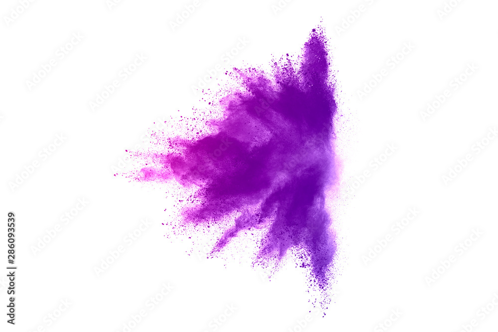 Fototapeta premium Freeze motion of purple color powder exploding on white background.