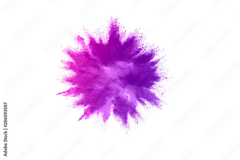 Freeze motion of purple color powder exploding on white background.