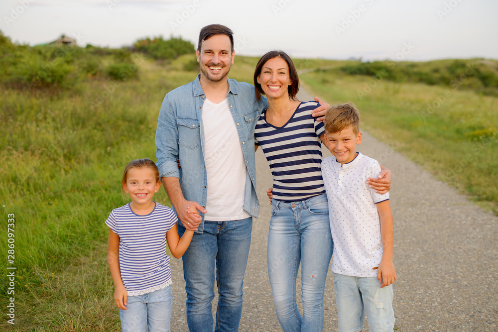 Happy family in nature. Happy family: mother, father, children son and daughter. life is made of little things. Happy family in nature. Happy family: mother, father, children son and daughter. life is made of little things.