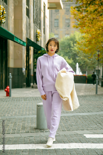 Asian girl in sportswear on the street © jeson