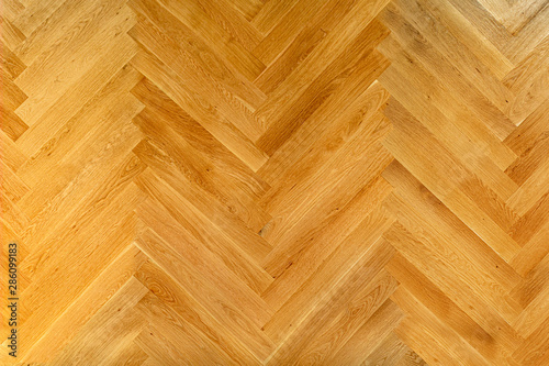 Wooden floor with herringbone pattern top view