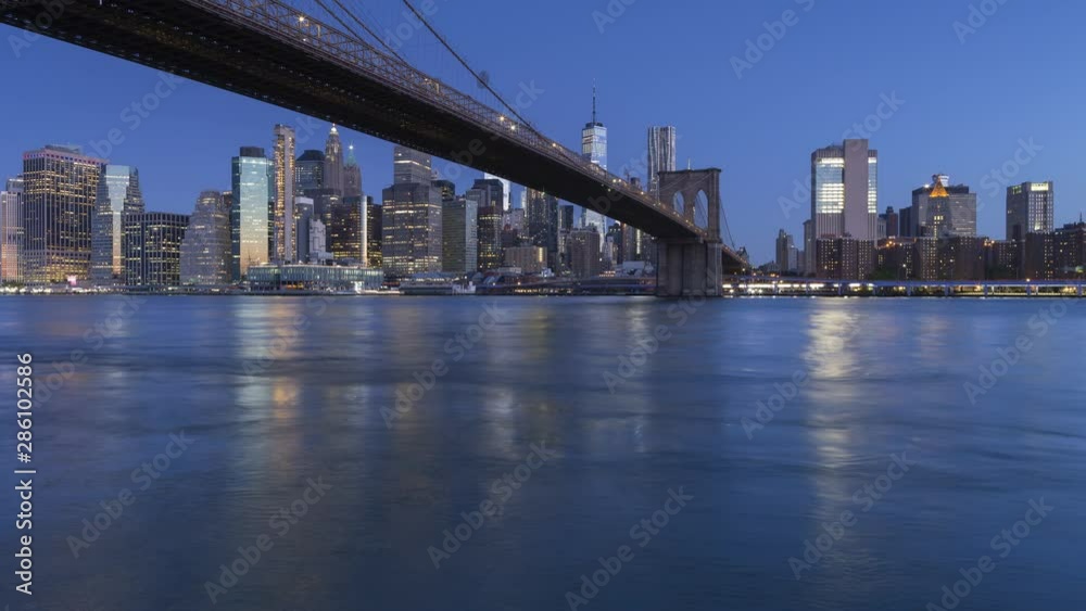 Financial District with brooklyn bridge night to day time-lapse Financial District with brooklyn bridge night to day time-lapse