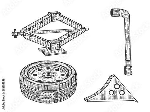 Spare tire and wheel replacement tools sketch engraving vector illustration. Scratch board style imitation. Black and white hand drawn image.