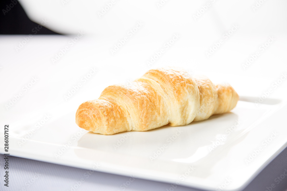 croissant with salmon on a white background croissant with salmon on a white background