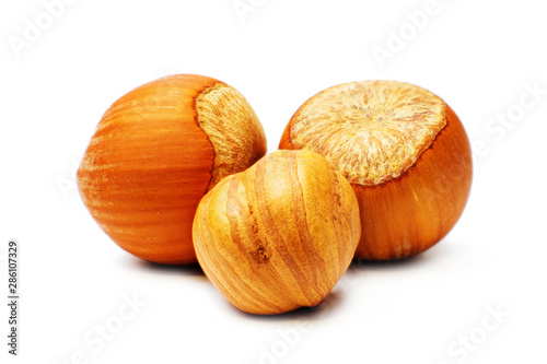 Closeup of hazelnuts isolated on white background