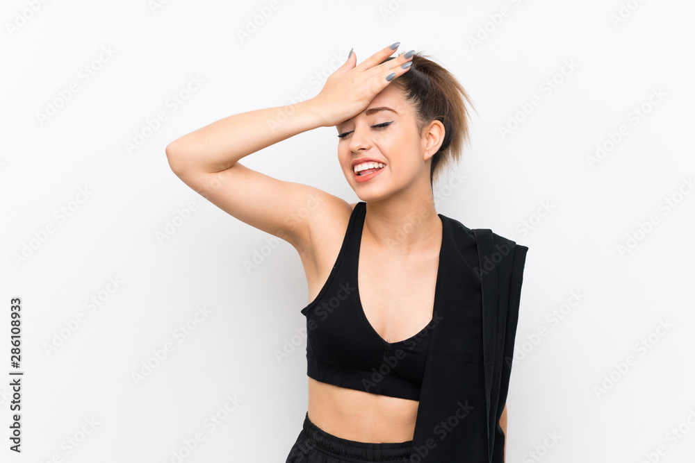 Young sport woman over white wall has realized something and intending the solution Young sport woman over white wall has realized something and intending the solution