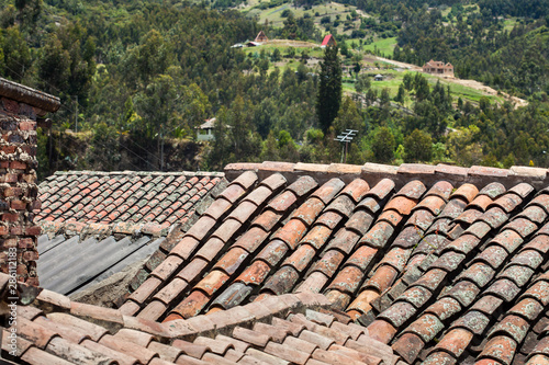 Antique clay roof tiles of the historical houses in the small town of Mongui in Colombia