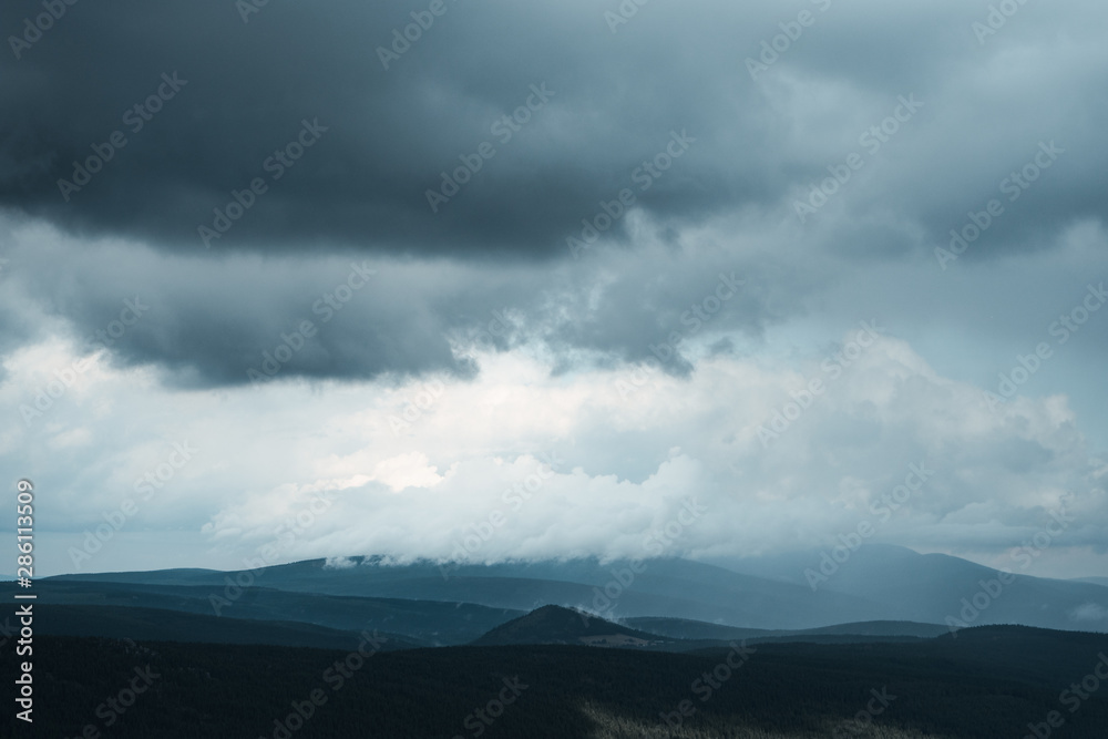Dark stormy sky background in Jizera mountain, Czech republic