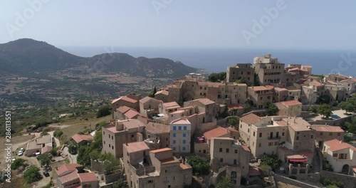Sant'Antonino / Sant'Antulinu di Balagna, aerial lateral traveling, Corsica, labelled Les Plus Beaux Villages de France. photo