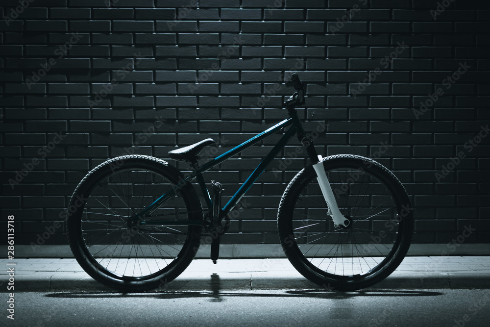 Street mouintainbike by the brick wall Street mouintainbike by the brick wall