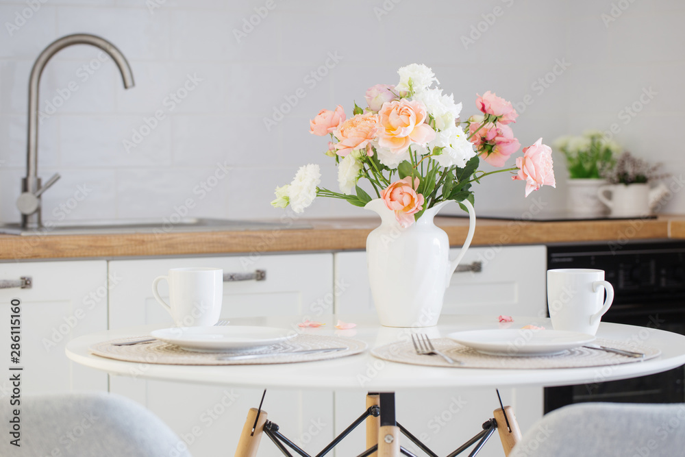 served table with bouquet of roses served table with bouquet of roses