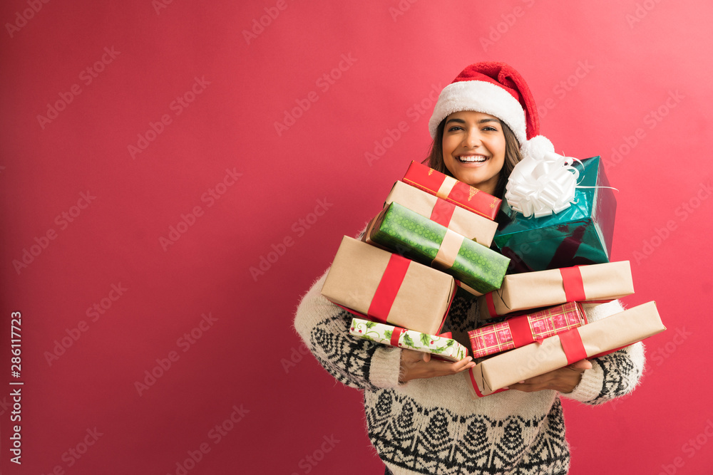 Beautiful Young Female With Xmas Presents In Studio Beautiful Young Female With Xmas Presents In Studio
