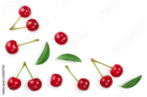 Some cherries with leaf closeup isolated on white background. With copy space for your text. Top view. Flat lay