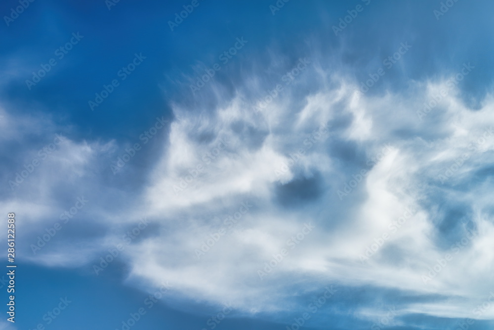 Blue sky background with white clouds