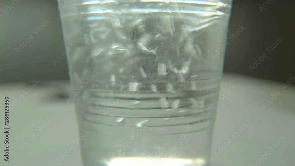cold water in the plastic glass 