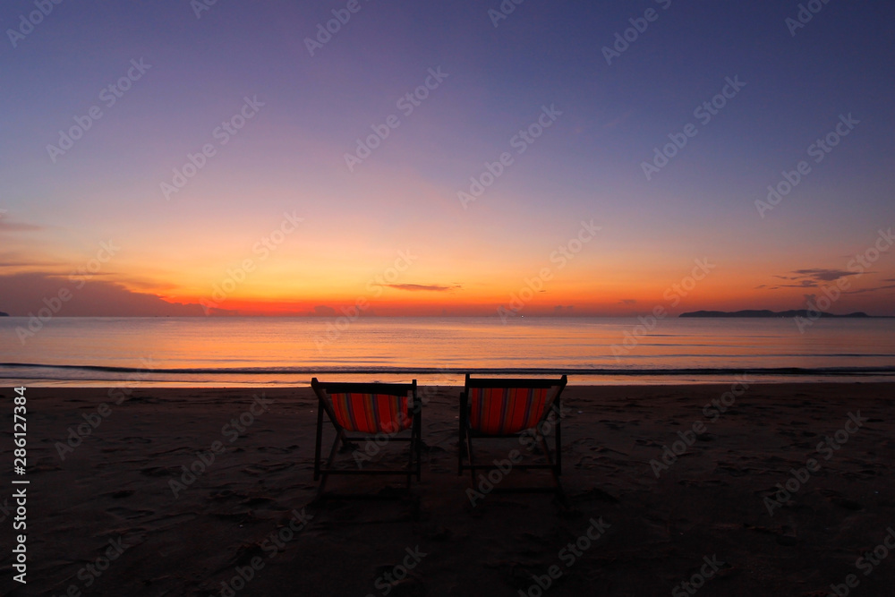 sunbed on the beach with beautiful sky background