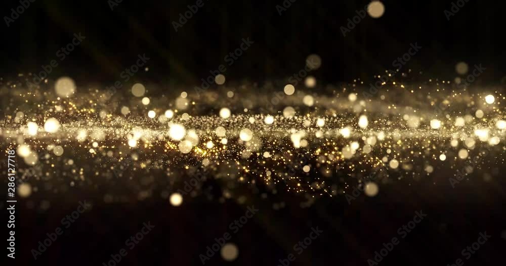 Gold glitter particles wave background, shining gold sparks and yellow glittery bokeh light. Gold glow and shimmering sparkles shine, abstract magic bright sparks in wave motion