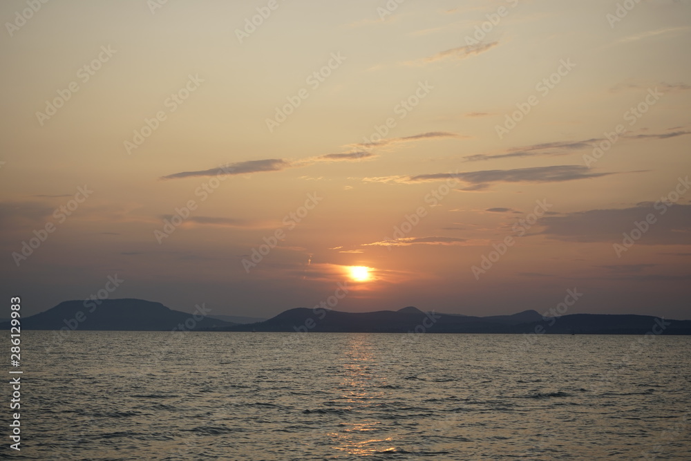 Naklejka premium Balatonlelle Hungary Europe summer sunset over the lake