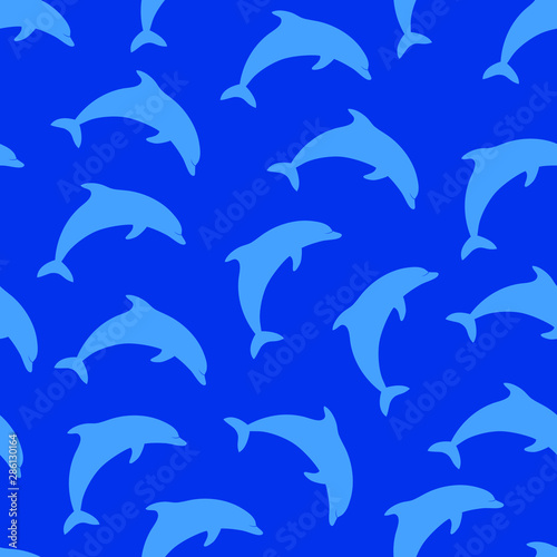 Blue pattern with dolphins. Vector seamless pattern with dolphin silhouettes on blue background. 