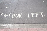 Look left sign pedestrian crossing London UK