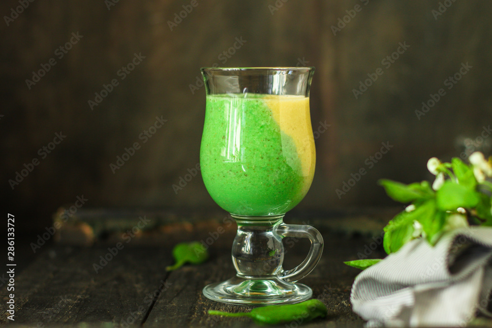 green smoothie (avocado, banana, spinach and other ingredients) menu. top food background. copy space green smoothie (avocado, banana, spinach and other ingredients) menu. top food background. copy space