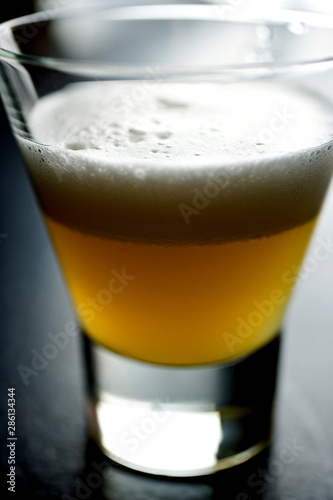 Close up of angostura sour punch served on table