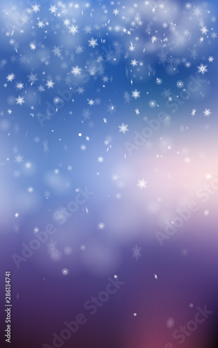 Winter bokeh background with little snowflakes