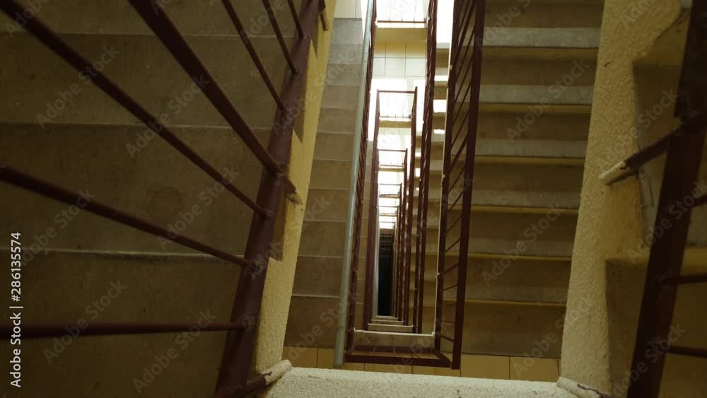 Stairs in a high-rise building. Concrete stairs. Steps in the entrance. Stairs in a high-rise building. Concrete stairs. Steps in the entrance.