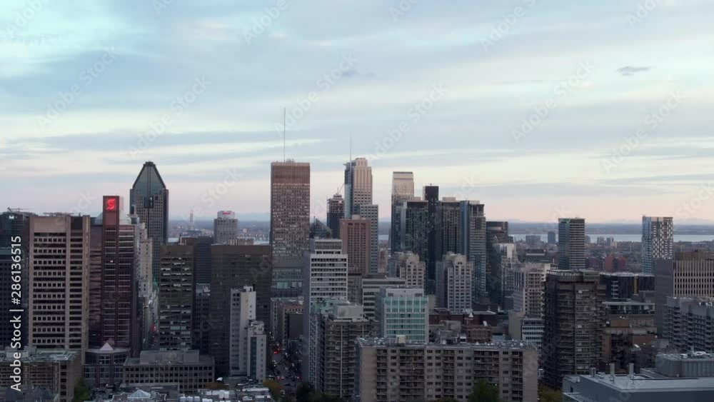 Montreal, Quebec, Canada, aerial jib shot of downtown Montreal showing office buildings at twilight. Montreal, Quebec, Canada, aerial jib shot of downtown Montreal showing office buildings at twilight.