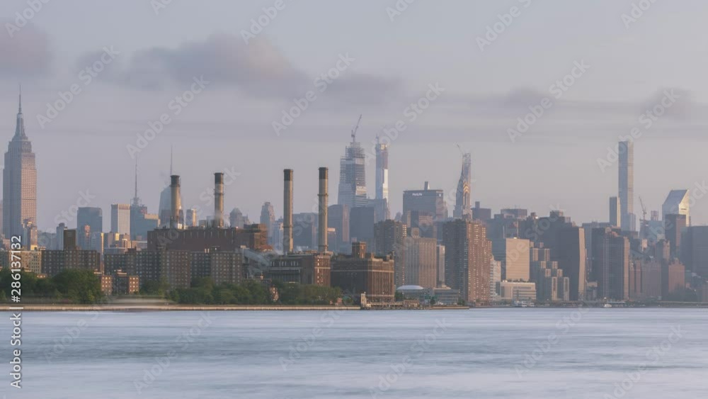 Midtown Manhattan From East River  Time-lapse.