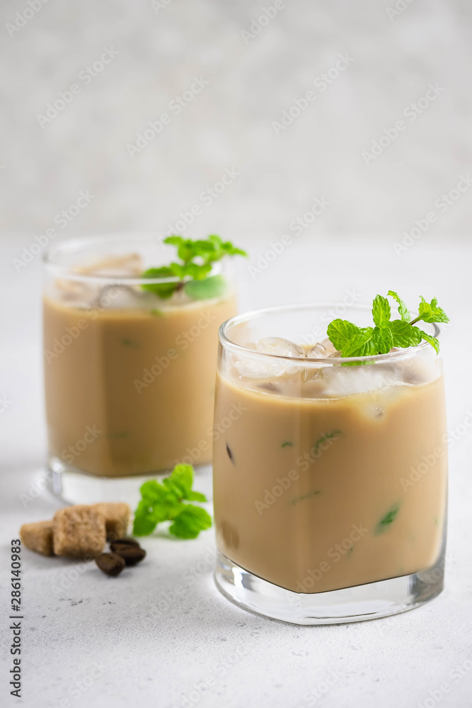Iced mint coffee. Selective focus, space for text. Iced mint coffee. Selective focus, space for text.