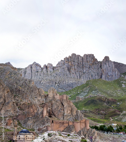 Dogubayazıt, Turkey, Middle East: panoramic view of Eski Bayezid Cami, the mosque located near the famous Ishak Pasha Palace, with the ancient castle of Old Beyazit on the road up to the mountains