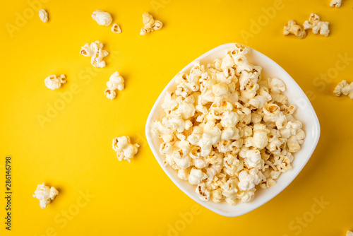 Popcorn on yellow background.