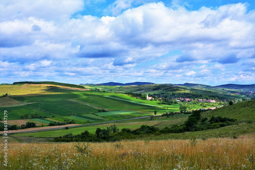 A beautiful rural landscape in Transylvania. Village of Hodosa Mures county - Romania
