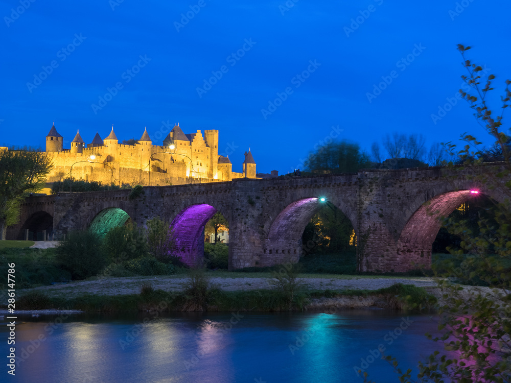 blue hour on the bridge of Carcassonne, south of France