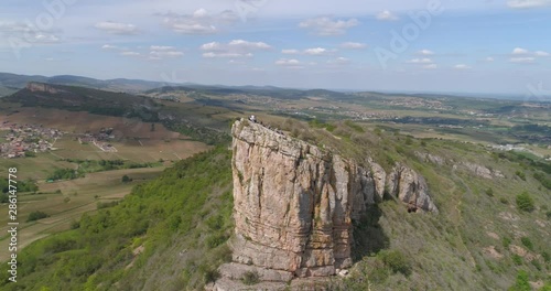 Fly around Solutré rock with tourists. Burgundy, France photo