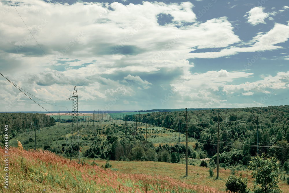 Electrical towers in the landscape in perspective Electrical towers in the landscape in perspective