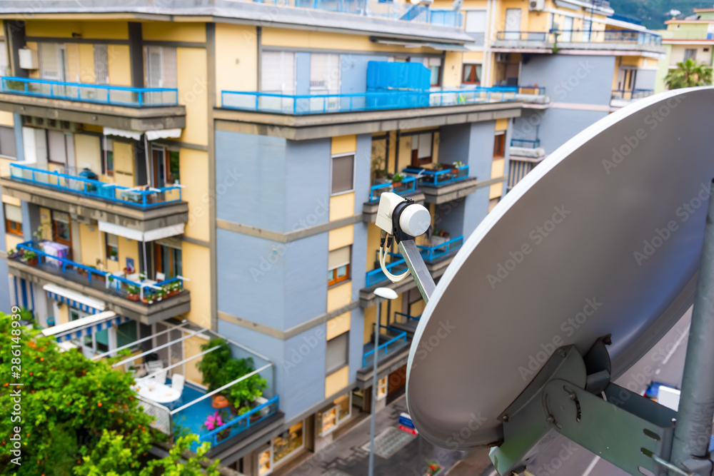 Close up of a satellite dish in an italian town Close up of a satellite dish in an italian town