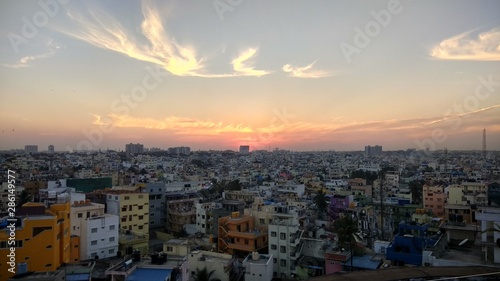 Sun set cityscape view of evening sky © Navin Rajagopal