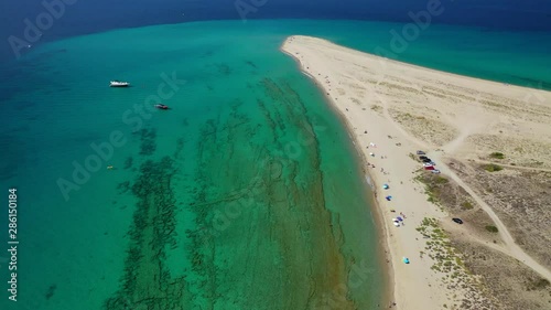 Aerial drone video of iconic Possidi paradise sandy turquoise beach and Peninsula in Kassandra, Halkidiki, North Greece photo