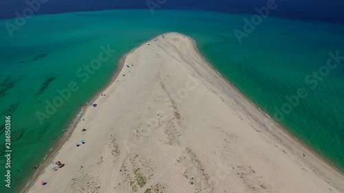 Aerial drone video of iconic Possidi paradise sandy turquoise beach and Peninsula in Kassandra, Halkidiki, North Greece photo