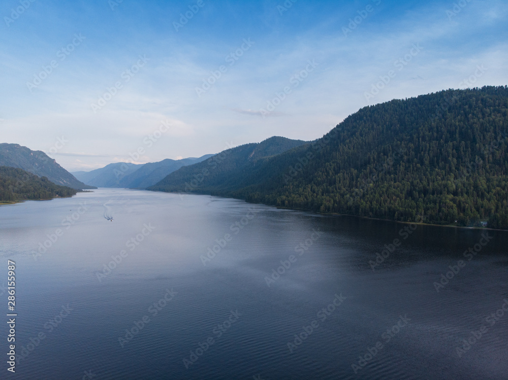 Aerial view on Teletskoye lake in Altai mountains, Siberia, Russia. Drone shot. Beauty summer day.